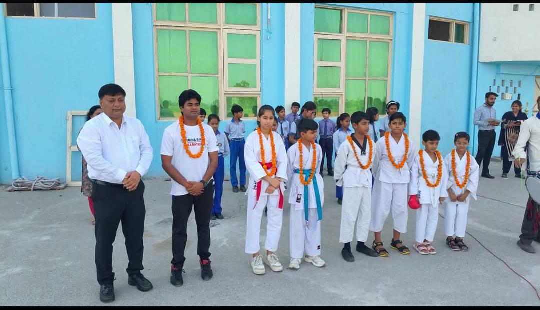 TNHA karate students with medals and certificates